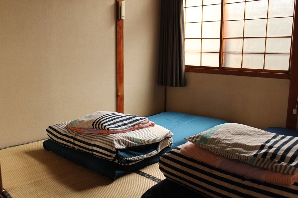 Guest House Shikotsu Kamui Титосе Екстериор снимка